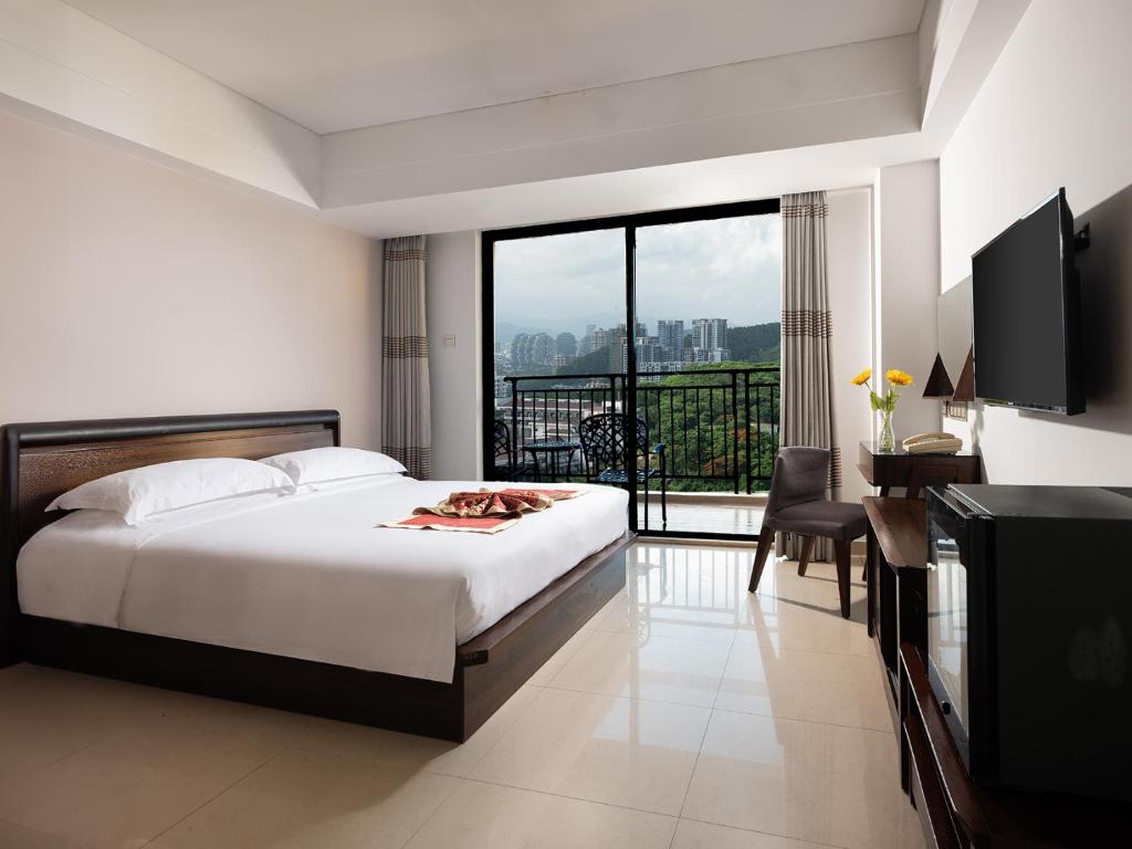 Отель BARRY BOUTIQUE SEAVIEW HOTEL SANYA номер с двуспальной кроватью.jpg